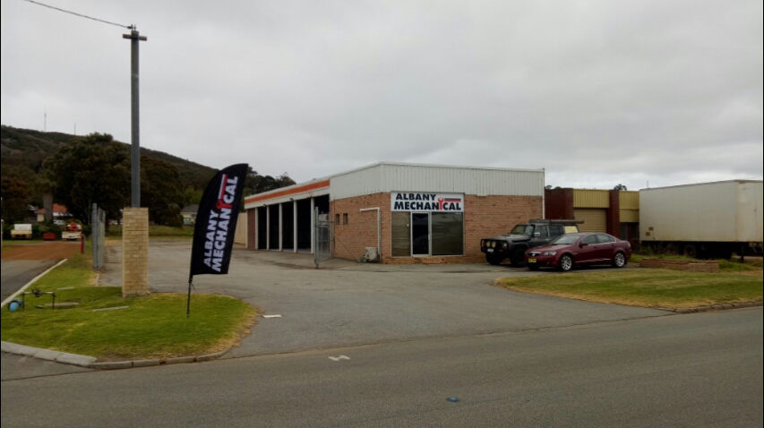 Albany Mechanical seen from Cockburn Road, with the branded feather flag at the driveway